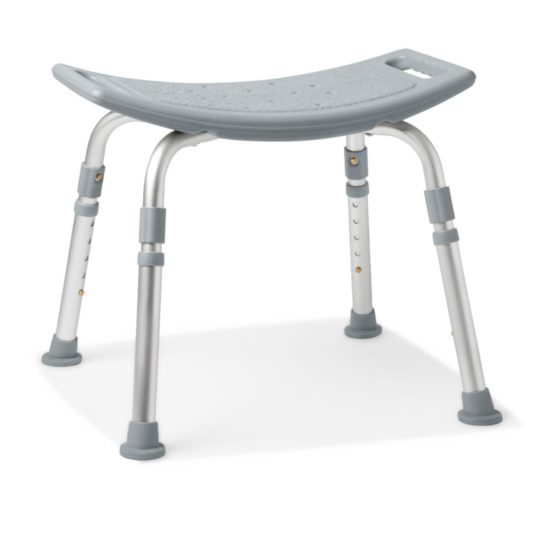 The Medline Bariatric Knockdown Portable Shower Chair without Back is gray, lightweight, and features a curved seat with drainage holes. It has sturdy, adjustable aluminum legs with rubberized feet for stability and a built-in handle on one side for easy carrying.